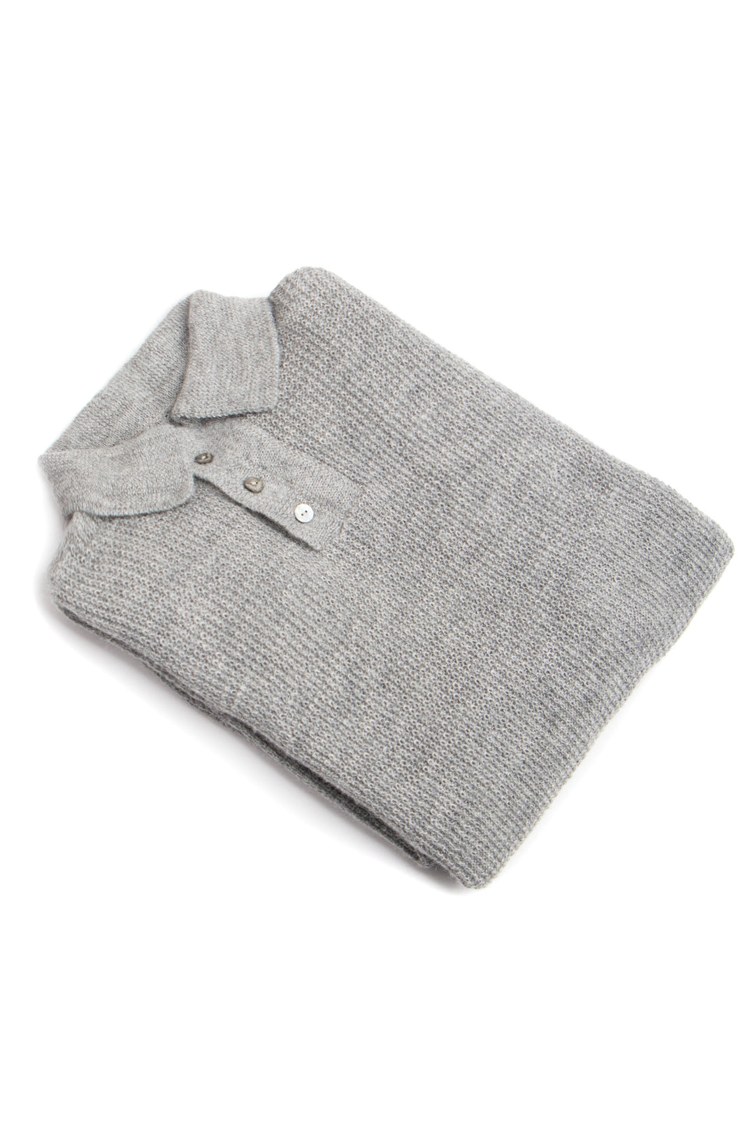 Folded gray polo shirt on a white background #colour_cool-grey